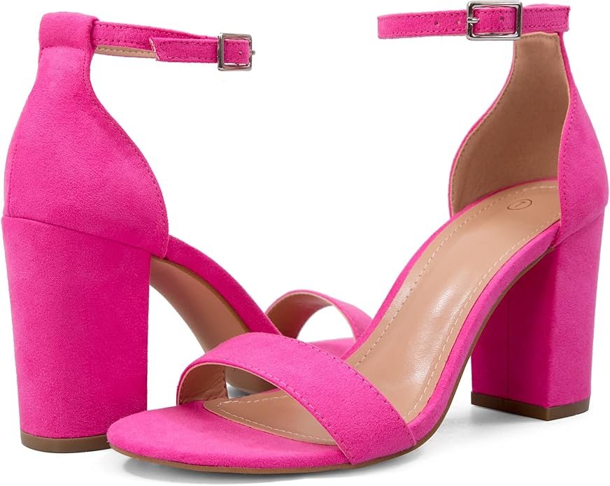 Vibrant pink ankle-strap block heels with an open toe and chunky heel, ideal for summer events.